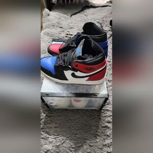 Nike Air Jordan 1 Mid in Black, Red, and Blue